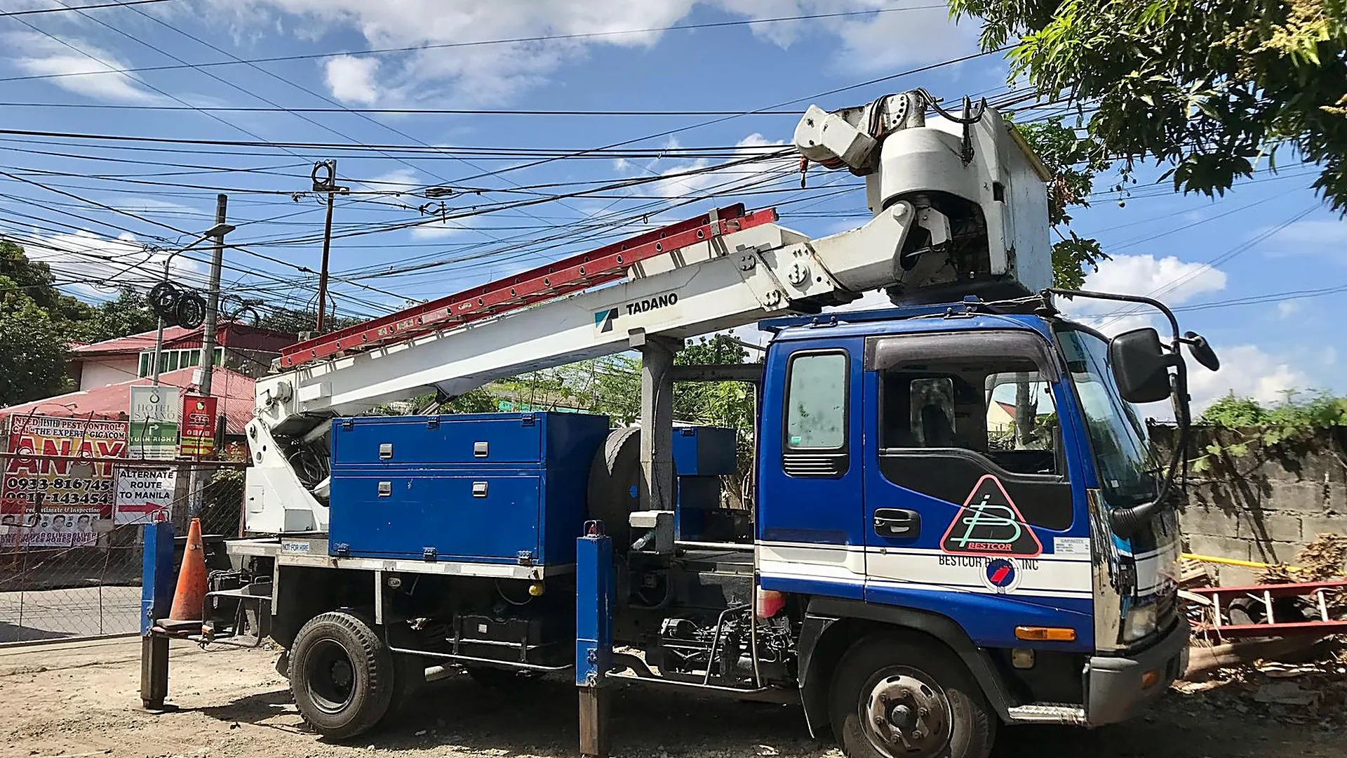 Bestcor-branded aerial bucket truck in the field.